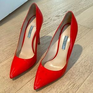 Authentic neon red Prada pumps 39 1/2.